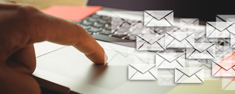 hand-tounching-laptop-sending-envelopes-for-mail-house-service