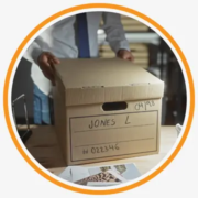 paper records boxed ready for scanning